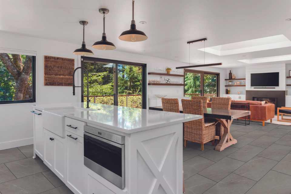 concrete stone look luxury vinyl in open concept farmhouse style living kitchen